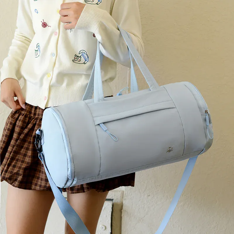 Light blue cylinder training duffel bag, model 2610